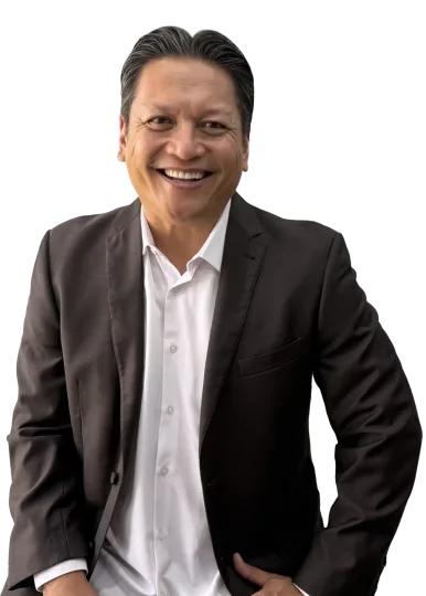 Jonathan Engalla smiling during leadership coaching session